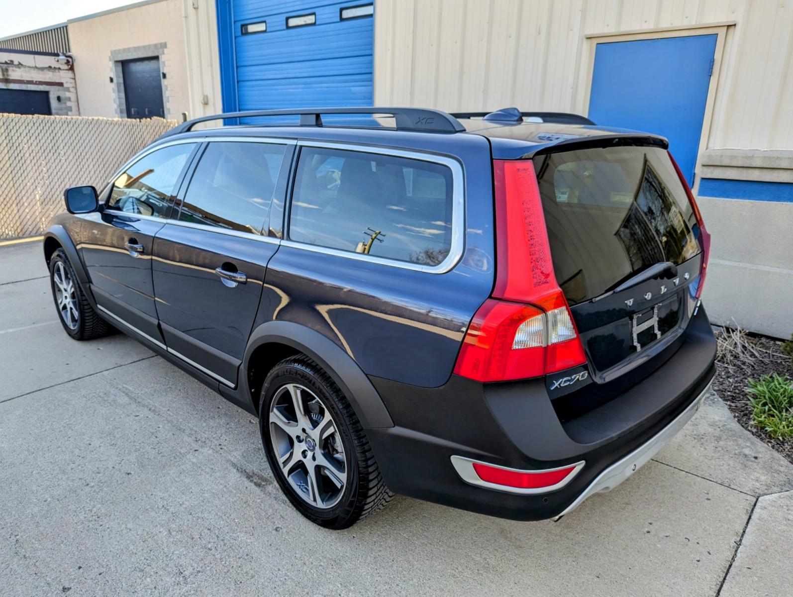2012 Blue Metallic /Black Leather Volvo XC70 (YV4902BZ0C1) with an 3.0L I6 F DOHC 24V engine, Automatic transmission, located at 603 Amelia Street, Plymouth, MI, 48170, (734) 459-5520, 42.378841, -83.464546 - Vehicles shown by appointment - Please call ahead - 734-459-5520, text 734-658-4573 or contact us via our web site at: http://www.selectmotors.com for complete Inventory, Photos, Videos and FREE Carfax Reports. 2012 Volvo XC70 T6 AWD, Platinum Package, Cypress Blue Metallic with black leather i - Photo #2